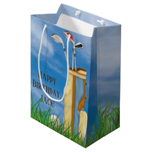 ゴルフバッグ及び芝生にボールを持つクラブ ミディアムペーパーバッグ (正面アングル)