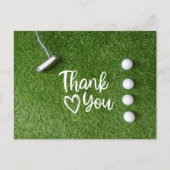 ゴルフパターは緑の芝生の上にあります ありがとう ポストカード (正面)
