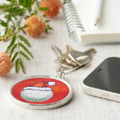 ゴルフボールがサンタ帽子をかぶって赤い背景に登場 キーホルダー (側面)