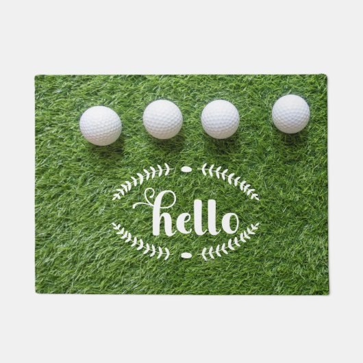 ゴルフボールを持つゴルファーの家へようこそ ドアマット (正面)