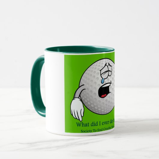 ゴルフマグは傷ついた感覚でゴルフボールを特徴とする マグカップ (正面左)