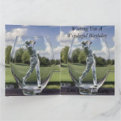 ゴルフ場のあるガラストンブラーの中のゴルフプレーヤー。 カード (内部)