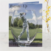 ゴルフ場のあるガラストンブラーの中のゴルフプレーヤー。 カード (黄色い花)