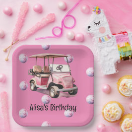 ゴルフ用のピンク色のボールが付いたゴルフカート ペーパープレート