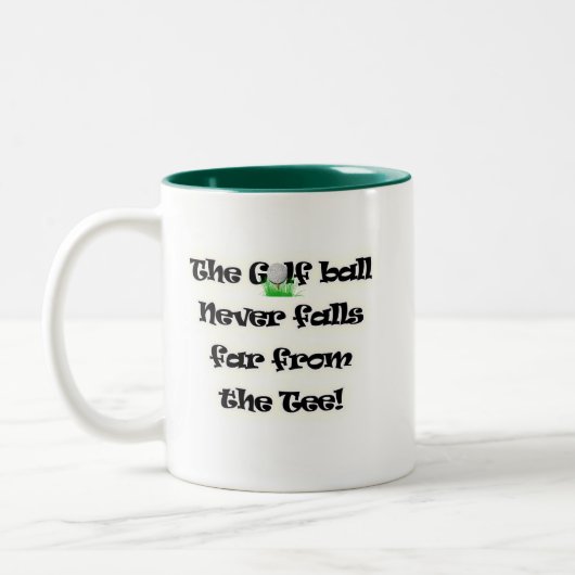 ゴルフ・ボールはティーから遠くに決して落ちません ツートーンマグカップ (左)