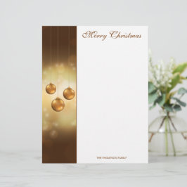 ゴールデンイエローのクリスマスボールと黄色いボケ レターヘッド