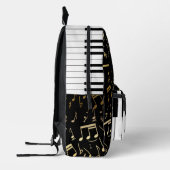 ゴールデンエレガントミュージックノートのピアノ鍵 プリントバックパック (左)