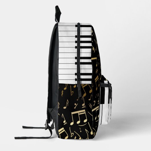 ゴールデンエレガントミュージックノートのピアノ鍵 プリントバックパック (左)