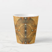 ゴールデンブラウンに散りばめられた床のパターン カフェラテマグ (正面)