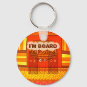 ゴールデンレッドア伝統的フリカおもしろいカラーズアムボー キーホルダー (正面)