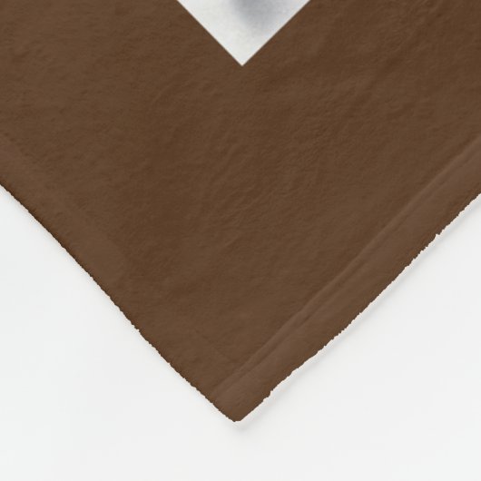 ゴールデンレトリバーの子犬が雪の中に フリースブランケット (角)