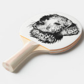 ゴールデンレトリバーの子犬のポートレート（白黒） 卓球ラケット (正面アングル)