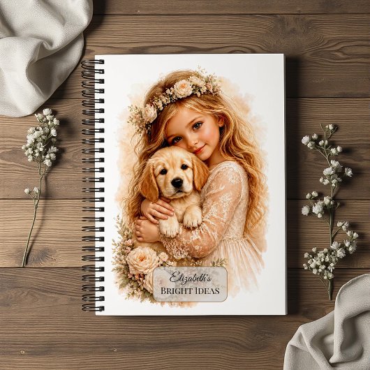 ゴールデンレトリーバーの子犬と少女 ノートブック