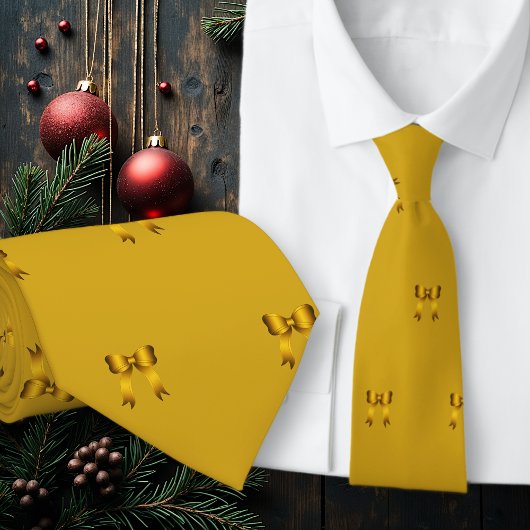 ゴールドのクリスマスの小さなリボンの模様 ネクタイ