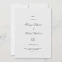 ゴールドの筆致が入った白い結婚式の招待状