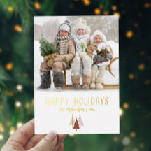ゴールドの華やかなクリスマスツリーの家族写真 ハッピー