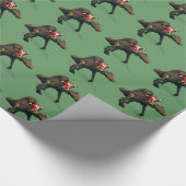 サイおもしろいノサウルスに乗るサンタクロース ラッピングペーパー (角)