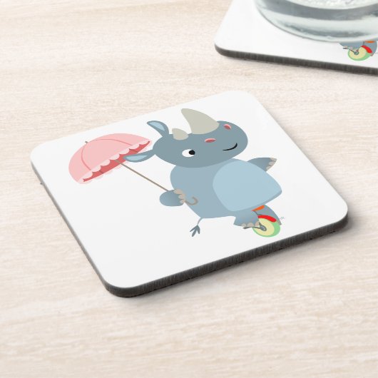 サイが一輪車のコースターに傘を付ける コースター (左側)