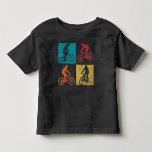 サイクリングカラフルBMXレトロバイクもしくは自転車に乗る人フリースタ トドラーTシャツ