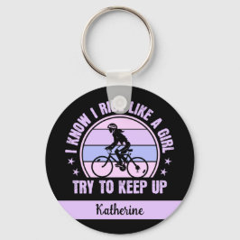 サイクリング女の子は保自転車を上げる キーホルダー