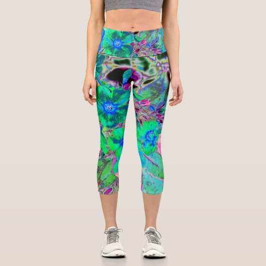 サイケデリックトリップ(幻覚体験)のような緑青の花 カプリレギンス (正面)