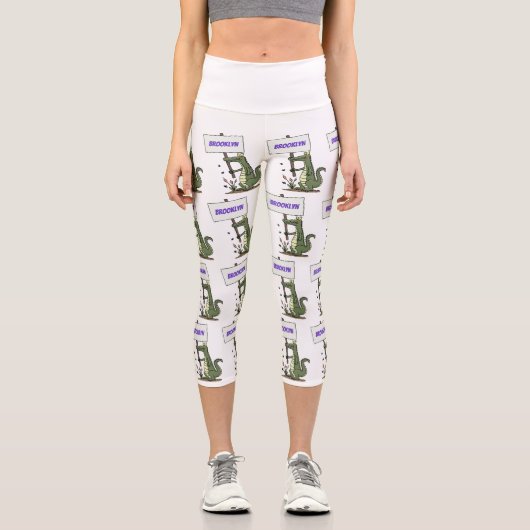 サインおもしろい漫画を持つワニのアリゲータ カプリレギンス (正面)