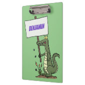 サインおもしろい漫画を持つワニのアリゲータ クリップボード (左)