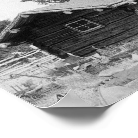 サウスダコタ州のログキャビンの外に座っている男性 ポスター (角)