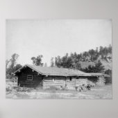 サウスダコタ州のログキャビンの外に座っている男性 ポスター (正面)