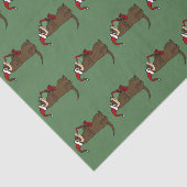 サクソフォーンのクリスマスのティッシュペーパーを遊んでいるフェレット 薄葉紙 (詳細)