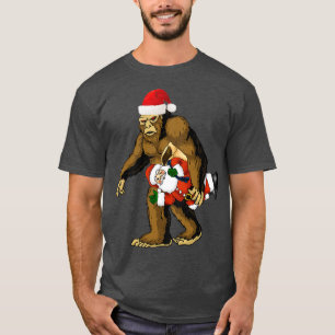 サスカッチおもしろいス運サンタクロウスビッグフットサンタ Tシャツ
