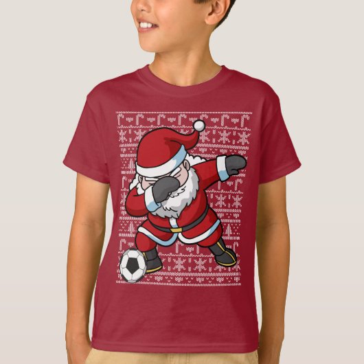 サッカーのサンタクロースの軽く押えるクリスマス Tシャツ (正面)