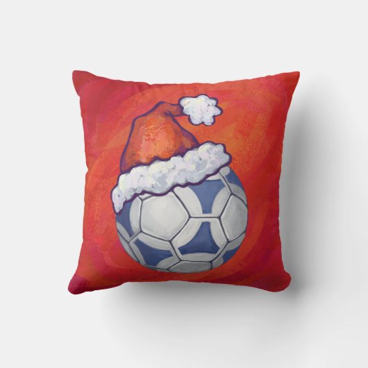 サッカーの青と白のフェスティバルが赤に浮かぶボール クッション (裏面)