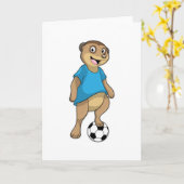 サッカーをしているミーアキャット カード (黄色い花)