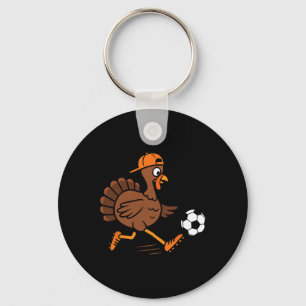 サッカーをする七面鳥 感謝祭 七面鳥 キッズ ボーイ キーホルダー