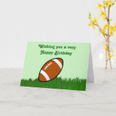 サッカーを芝生に乗せたハッピーバースデー カード (黄色い花)