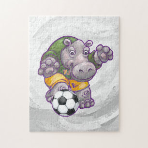 サッカーを遊んでいるカバ ジグソーパズル
