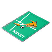 サッカーテーマ選手イラストレーションスポーツチームグリーン ノートブック (左側)