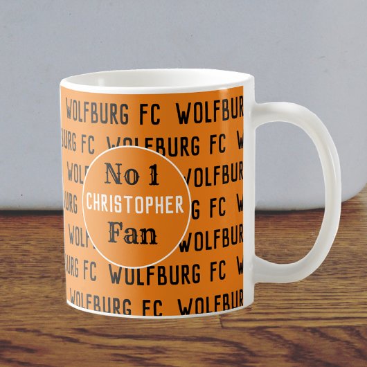 サッカーファンまたはサッカーサポーター金ゴールド&ブラック コーヒーマグカップ