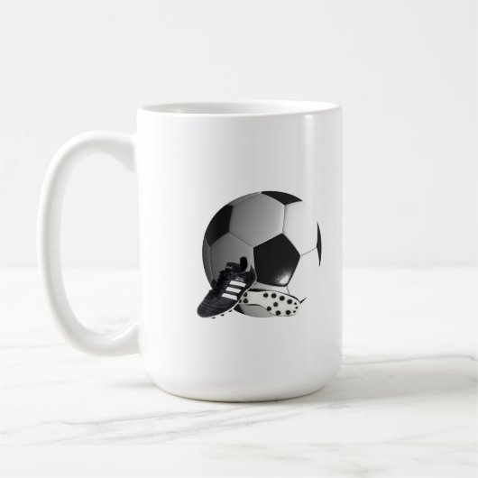 サッカーボールとシューズ コーヒーマグカップ (左)