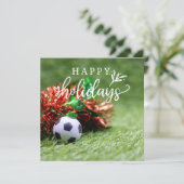 サッカーボールと緑の芝生の上でのサッカーハッピー ホリデー シーズンカード (スタンド正面)