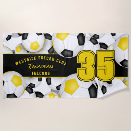 サッカーボールの多くの黒い金ゴールドチームのスピリットギフト ビーチタオル