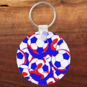 サッカーボールの赤と白の抽象芸術 キーホルダー (正面)