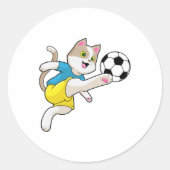 サッカーボールを持ったサッカー選手としての猫 ラウンドシール (正面)
