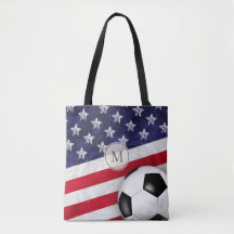 サッカーボールを持つアメリカ赤白と青のアメリカ国旗