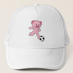サッカーボールを持つサッカー選手としての豚 キャップ
