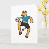 サッカーボールを持つサッカー選手のキリン カード (黄色い花)