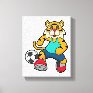 サッカーボールを持つサッカー選手のタイガー キャンバスプリント