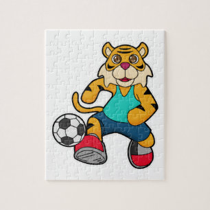 サッカーボールを持つサッカー選手のタイガー ジグソーパズル