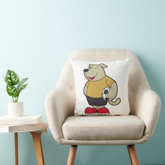 サッカーボールを持つサッカー選手の犬 クッション (椅子)